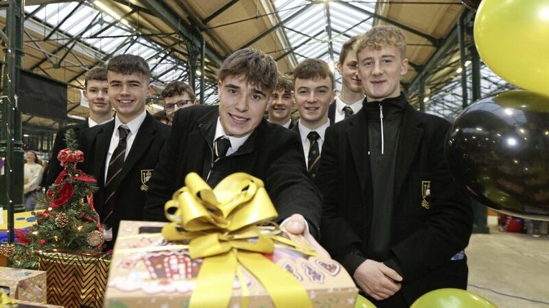 Pupils from Royal Belfast Academical Institution (RBAI) taking part in the Young Enterprise NI event at St George&#39;s Market in Belfast. Picture by Hugh Russell 