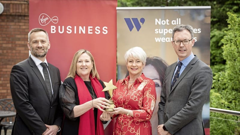 September 30 is the deadline for entries for this year&#39;s Women in Business Awards. Reminding women to submit their entries are (from left) Seamus McCorry, regional director for Virgin Media Business in Northern Ireland; Women in Business chief executive Roseann Kelly; Pamela Ballantine, who will host the gala awards evening at the Crown Plaza Hotel on November 7; and John Brolly, marketing manager at the Irish News (media partners) 