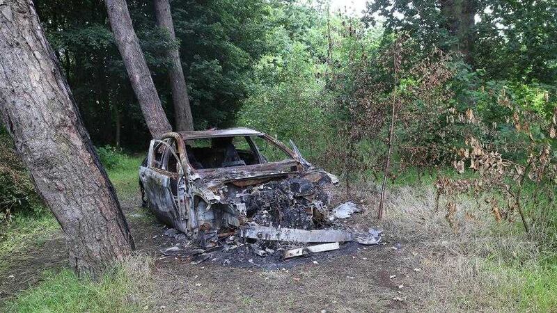 The burnt out car was found in Ormeau Park in Belfast. Picture by Hugh Russell