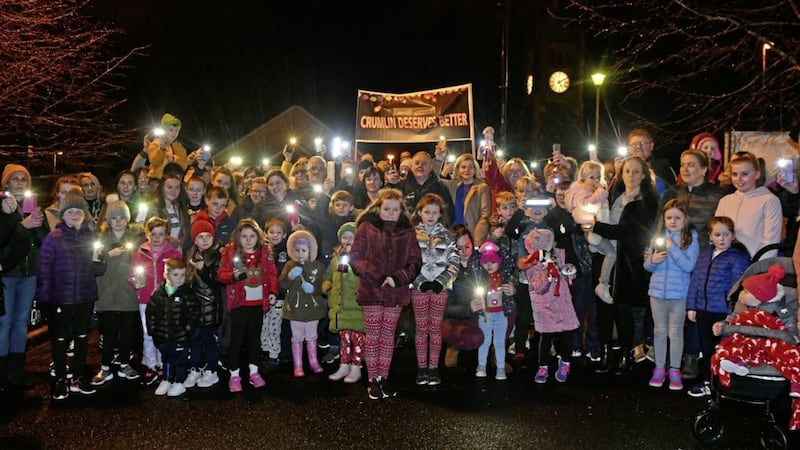 Residents from Crumlin held a torchlight protest on Sunday evening after Antrim and Newtownabbey Borough Council cut Christmas decoration funding  