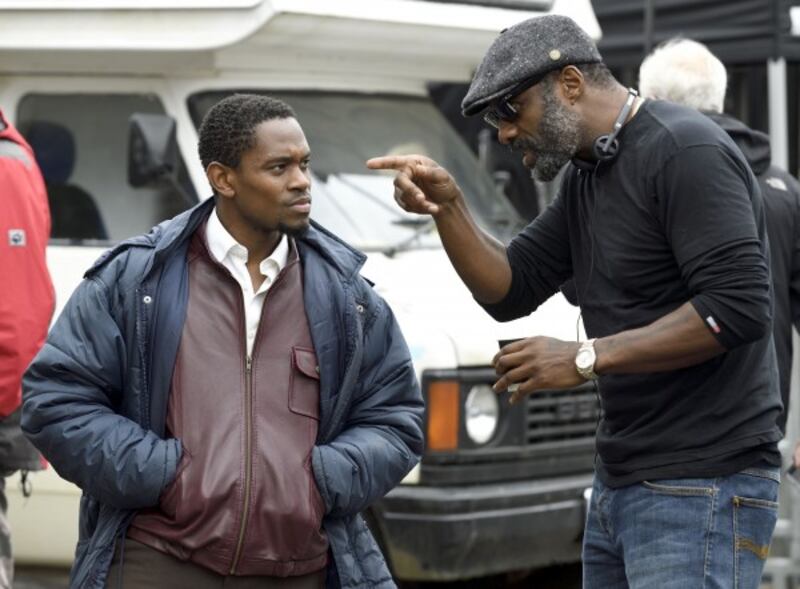 Idris Elba (right) with lead actor Aml Ameen on the set of Yardie 