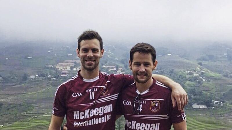 Cushendall club-mates Neil McManus and Arron Graffin on the mountains of Sapa, Vietnam. McManus features in Graffin&#39;s best sick-note excuse 