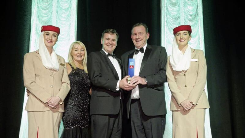 Peter Hannan (second right) receives the business personality of the year award from Enda Corneille of Emirates, watched by Brenda Buckley of Business Eye. Also pictured are Emirates cabin crew members Enya Barry and Meghan Quigley 