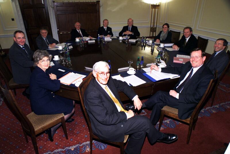 2002 - The new Ulster Executive. Clockwise: SDLP's Seamus Mallon, Brid Rodgers, Mark Durkan, Sean Farren, Ulster Unionists Sam Foster, Sir Reg Empey, Sinn Féin's Michael McGimpsey, Barbara de Bruin, Martin McGuinness and the UUP's David Trimble. Missing were ministers Nigel Dodds and Peter Robinson of the DUP, who refused to sit in cabinet with Sinn Féin