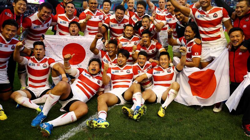 Japan celebrate their stunning victory over South Africa at the Brighton Community Stadium on Saturday<br />Picture: PA