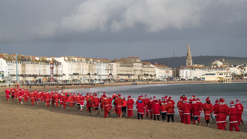 Hundreds of red-suited runners took part in the 5km fun run along the seafront.