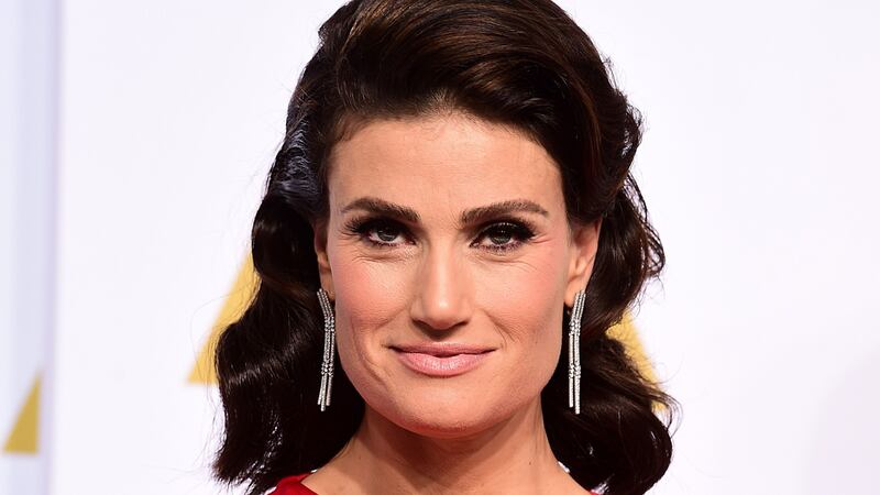 Idina Menzel said her father and her son walked her down the aisle.