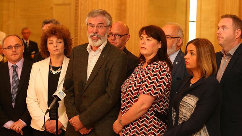 Sinn F&eacute;in president Gerry Adams and the party's seven newly-elected MPs speak to the media at Stormont. Picture Mal McCann&nbsp;