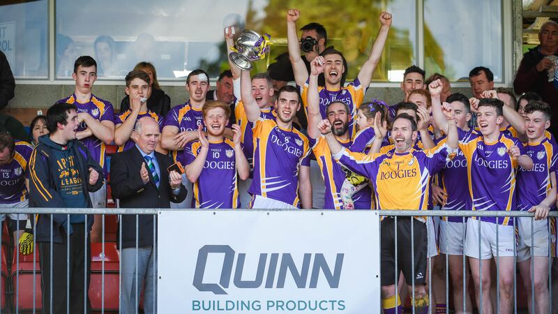 Derrygonnelly captain Ryan Jones lifts the New York Cup after the Harps defeated Erne Gaels at Brewster Park, Enniskillen<br />&nbsp;