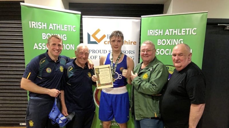 Kane Tucker with IABA president Dominic O&#39;Rourke and Holy Family coaches Gerry Storey, Gerry Storey jr and Kevin Morgan 