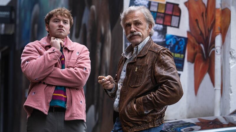 Cooper Hoffman (left) and Christopher Waltz in a new still from Old Guy, an action comedy movie recently filmed in Belfast. Picture: Highland Film Group