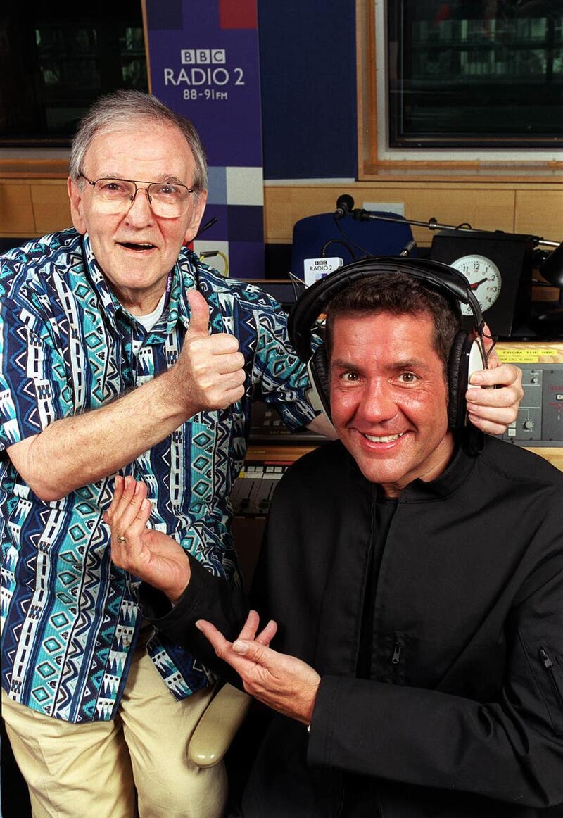 With Alan ‘Fluff’ Freeman as the veteran DJ handed over the reins of his BBC Radio 2 show Pick of the Pops to Winton in 2000 (Jeff Overs/BBC)