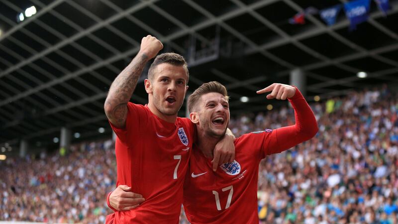 England's Jack Wilshire (left) celebrates with team mate Adam Lallana after scoring in Sunday night's European Championship qualifying win over Slovenia at the Stozice Stadium<br />Picture: PA&nbsp;