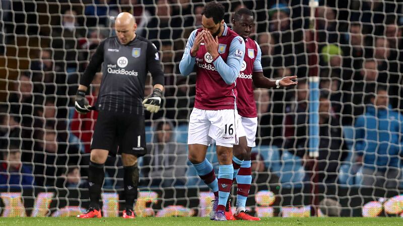 Aston Villa's Brad Guzan, Joleon Lescott and Aly Cissokho are dejected after conceding their third goal during the Barclays Premier League match at Villa Park<br />Picture by PA&nbsp;