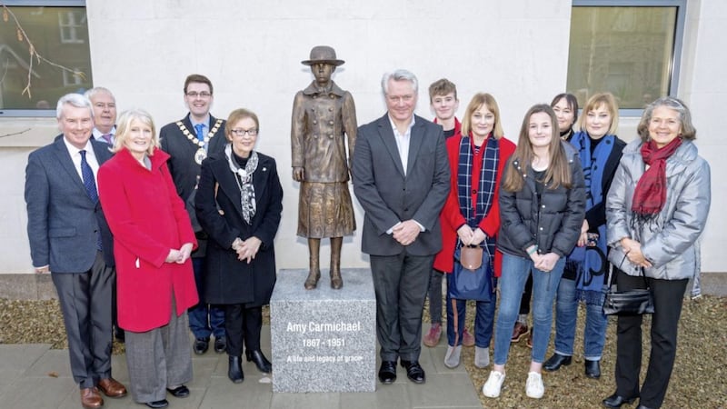 A bronze sculpture of Amy Carmichael created by Ross Wilson was unveiled by Margaret Bingham, wife of the late Derick Bingham. Picutred are members of the Bingham family with left, Rev David Johnston, minister of Hamilton Road Presbyterian Church, councillor Bill Keery, Lesley Stewart from Bangor Worldwide Missionary Convention, Ards and North Down mayor Robert Adair, Margaret Bingham and Ross Wilson. Pictured far right is Valerie Elliot Shepherd, daughter of Elisabeth Elliot who wrote a biography of Amy Carmichael. 