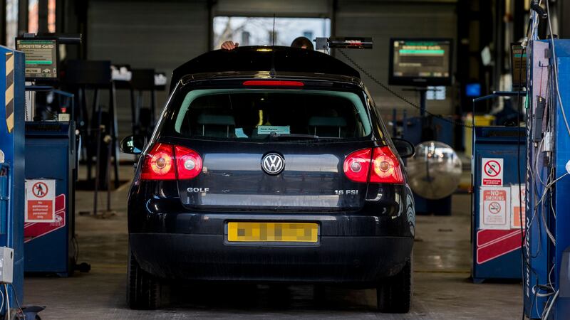 A vehicle during its MOT test (PA)