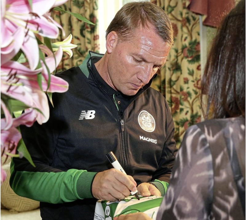 Celtic boss Brendan Rodgers signs autographs at the Culloden Hotel. Picture by Hugh Russell 
