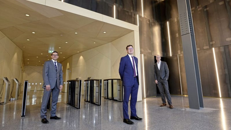 Pictured in the lobby of the new Merchant Square building are (from left) Geoff Sharpe (Danske Bank), Adam Dickson (Oakland Holdings) and Brian Loughran (Radius Corporate Finance)                      