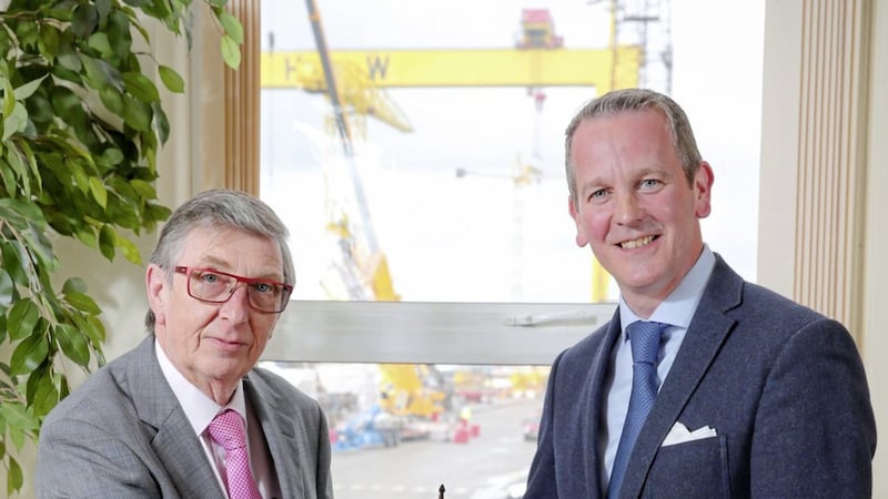 Robert J Cooper congratulates Jonathan Guest on succeeding him into the CEO seat at Harland &amp; Wolff 