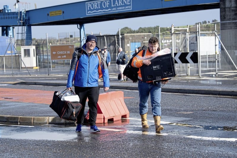 Crew members leaving P&amp;O&#39;s MV European Causeway at Larne Port yesterday. Picture by Pacemaker Press. 