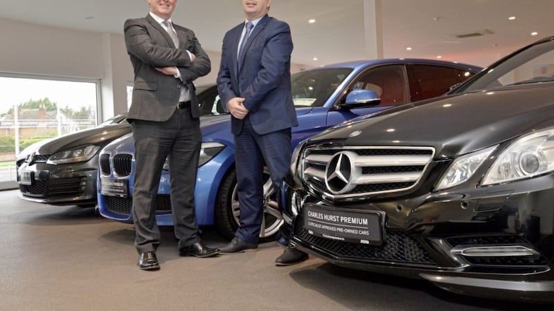 Brian Walsh (right), general manager for Charles Hurst Premium and Usedirect Ireland, is joined by Jeff McCartney, sales operations director, as the car retailer launches its new Dublin-based showroom 