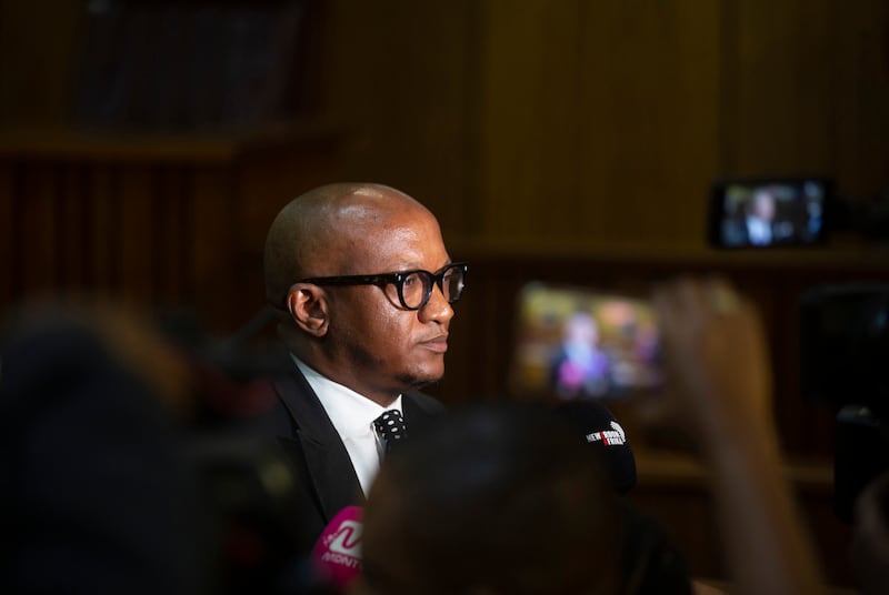 National Prosecuting Authority spokesman Mthunzi Mhaga did not say when the arrest would be made but confirmed the judgement paved the way for it to occur (AP Photo/Denis Farrell)