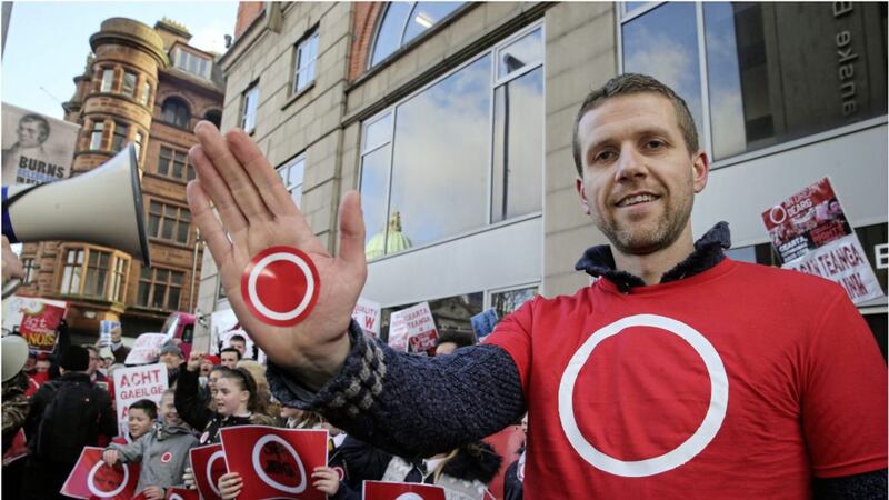 Ciar&aacute;n Mac Giolla Bh&eacute;in, from An Dream Dearg, at the protest at the Department for Communities in Belfast. Picture by Hugh Russell 