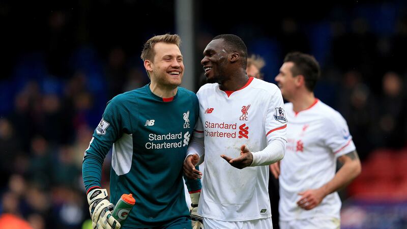 Liverpool goalkeeper Simon Mignolet with match winner Christian Benteke at the end of Sunday's game against Crystal Palace at Selhurst Park<br />Picture by PA&nbsp;