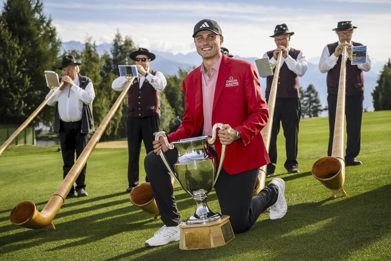 Ludvig Aberg poses with the trophy after winning the Omega European Masters in Crans-Montana, Switzerland on Sunday              PICTURE: PA