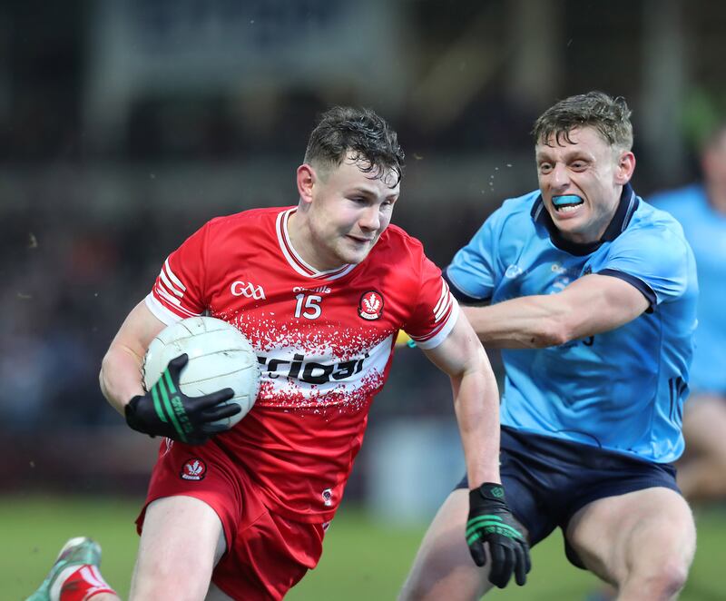 Derry forward Cormac Murphy takes on Cian Murphy of Dublin