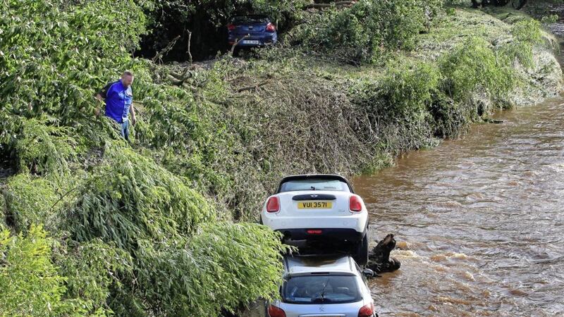 Cars were swept into the River Faughan at Drumahoe, Co Derry, during Tuesday night&#39;s storms. Picture by Margaret McLaughlin 
