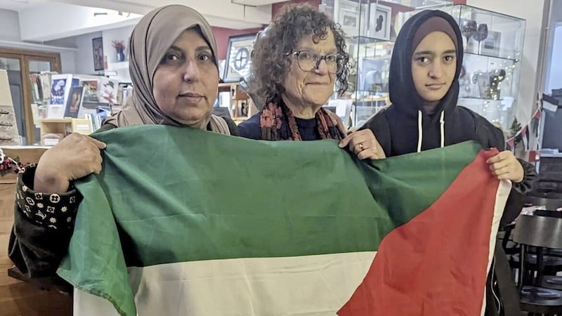 Sue Pentel (centre) pictured last week in Belfast with Nawal Slemiah and her daughter Haifa 