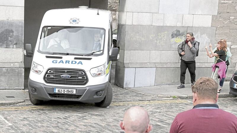 A Garda Van leaving the Children&#39;s Court in Dublin last May, where a teenage boy was appearing, following the discovery of the body of 14-year-old Ana Kriegel 