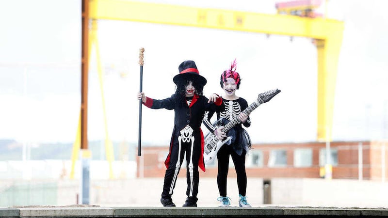 Mini `rockstars&#39; Lorcan and Mia Clancy from Castlewellan gear up for Belfast&#39;s Halloween Monster Mash 