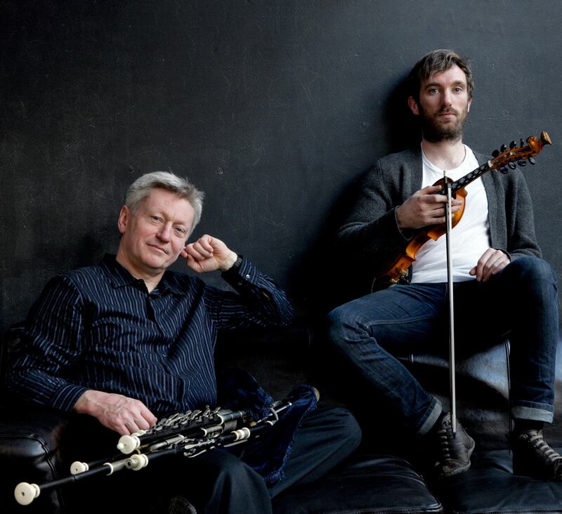 Mick O'Brien & Caoimhín Ó Raghallaigh with their instruments.