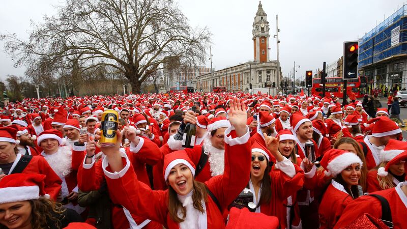 Revellers donned their best red suits and fancy dress outfits for the annual tradition.