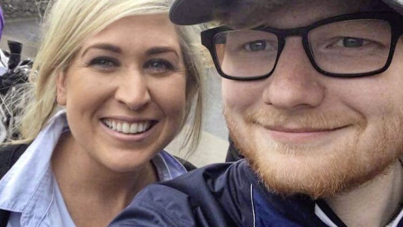 Sinead Vaughan pictured with singer Ed Sheeran at Ardglass Golf Club yesterday 