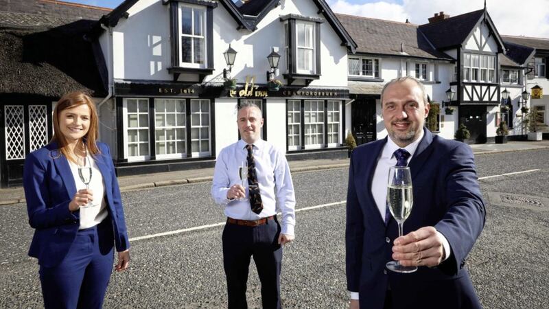 Charlotte McClean, Andy Johnston and Colin Johnston celebrate the addition of The Old Inn Crawfordsburn to the Galgorm portfolio. 