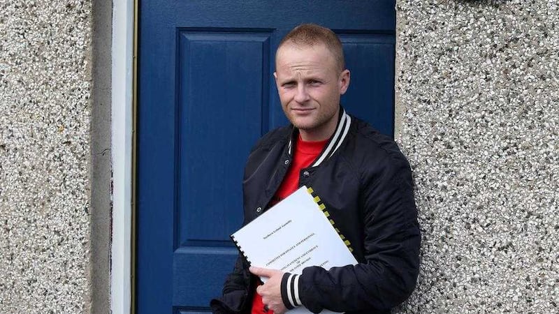 Blogger Jamie Bryson with the evidence file he submitted to the Stormont finance committee 