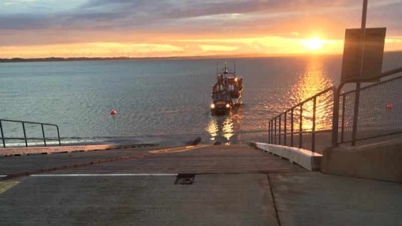 The RNLI lifeboat being launched at Newcastle in Co Down to go to the aid of two fishing crews whose boats collided. Picture by RNLI Newcastle