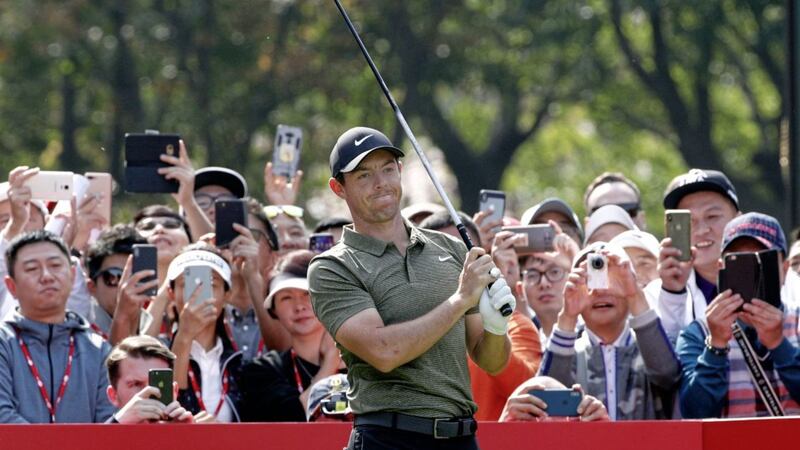 Rory McIlroy prepares to tee off during the HSBC Champions golf tournament held at the Sheshan International Golf Club in Shanghai, Thursday October 25, 2018. This year HSBC Champions at Sheshan International starts with a top-heavy field that includes five of the six top players in the world and all the major champions from this year. (AP Photo/Ng Han Guan) 