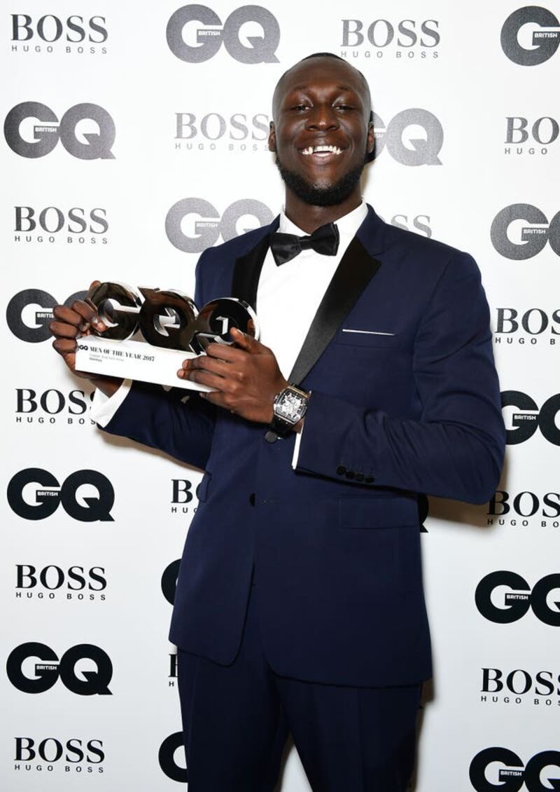 Stormzy with his Copper Dog Whiskey Solo Artist award during the GQ Men of the Year Awards