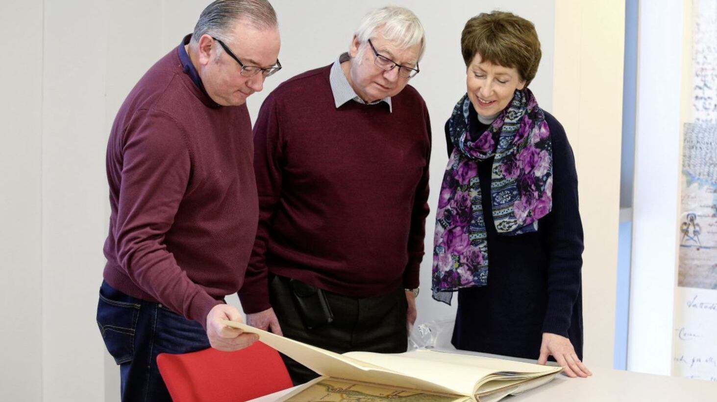 A group of &#39;Getting Started&#39; participants perusing rare and precious documents at the Proni building in Belfast. Picture by Mal McCann 