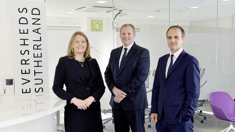 Eversheds Sutherland Belfast partners Lisa Bryson (employment and immigration), Gareth Planck (real estate) and Matthew Howse (dispute resolution &amp; litigation) pictured in the firm&#39;s new Belfast city centre offices 