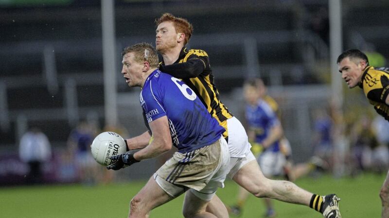 Scotstown&#39;s Kieran Hughes takes the fight to Crossmaglen in the 2015 Ulster Club Championship final. Pic Colm O&#39;Reilly. 