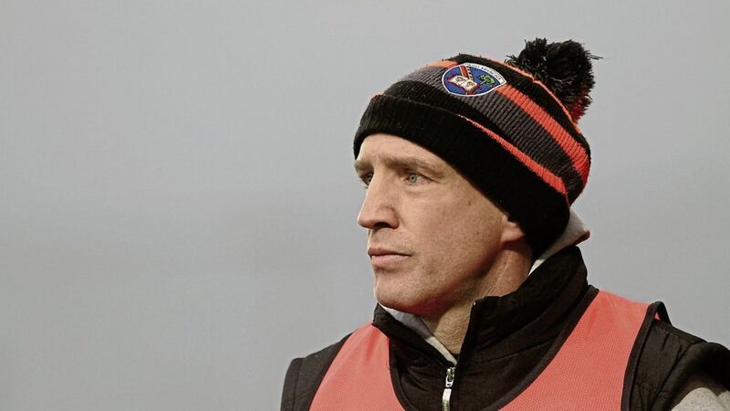 Armagh manager Kieran McGeeney may have the edge on his Down counterpart, despite being confined to the stands 