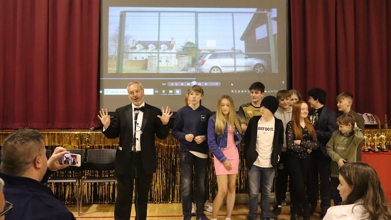 Seamus Hanna, principal of St Colmcille's High School in Crossgar, with pupils who made Framed, a short movie, which won the school's inaugural film festival&nbsp;