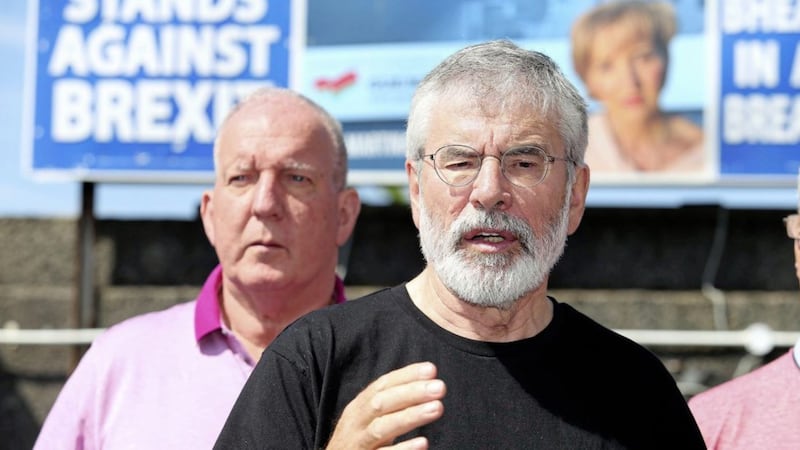 Bobby Storey with former Sinn F&eacute;in leader Gerry Adams 
