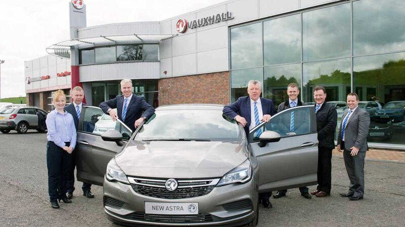 At the launch are (from left) Fianche McCallion (Vauxhall dealer principal Omagh), Malcolm Kerr (group managing director), Robert Fitzpatrick (group HR director), Terence Donnelly (group executive chairman), James Simpson (Vauxhall sales executive), Basil Virtue (Vauxhall Sales manager) and Dean Martin (group sales director). 