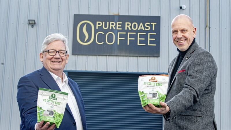 Pure Roast Coffee founder Martin Symington with Invest NI&rsquo;s food and drink director, John Hood. 